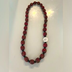 Hand made vintage necklaces made from fabric and beeded.